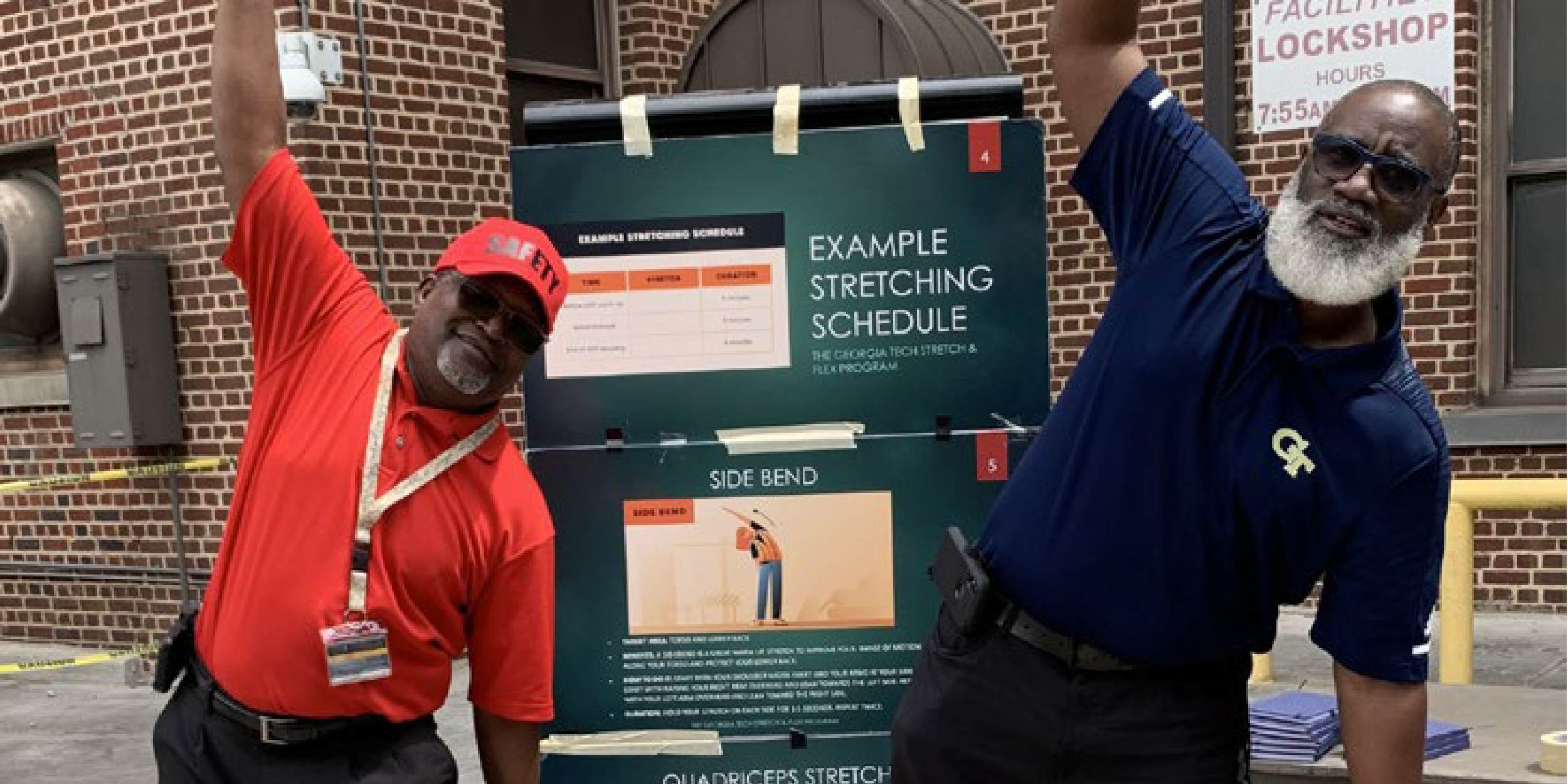 two people stretching at the EH&S annual health and safety fair for I&S employees