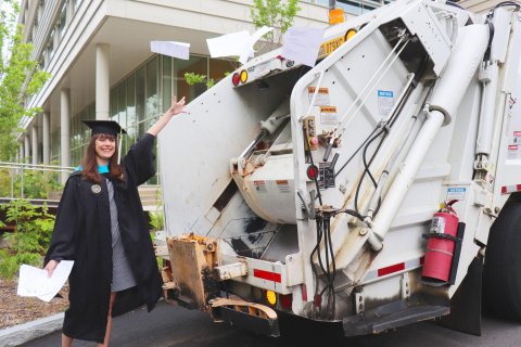 Emma Brodzik graduate gown and recycling truck